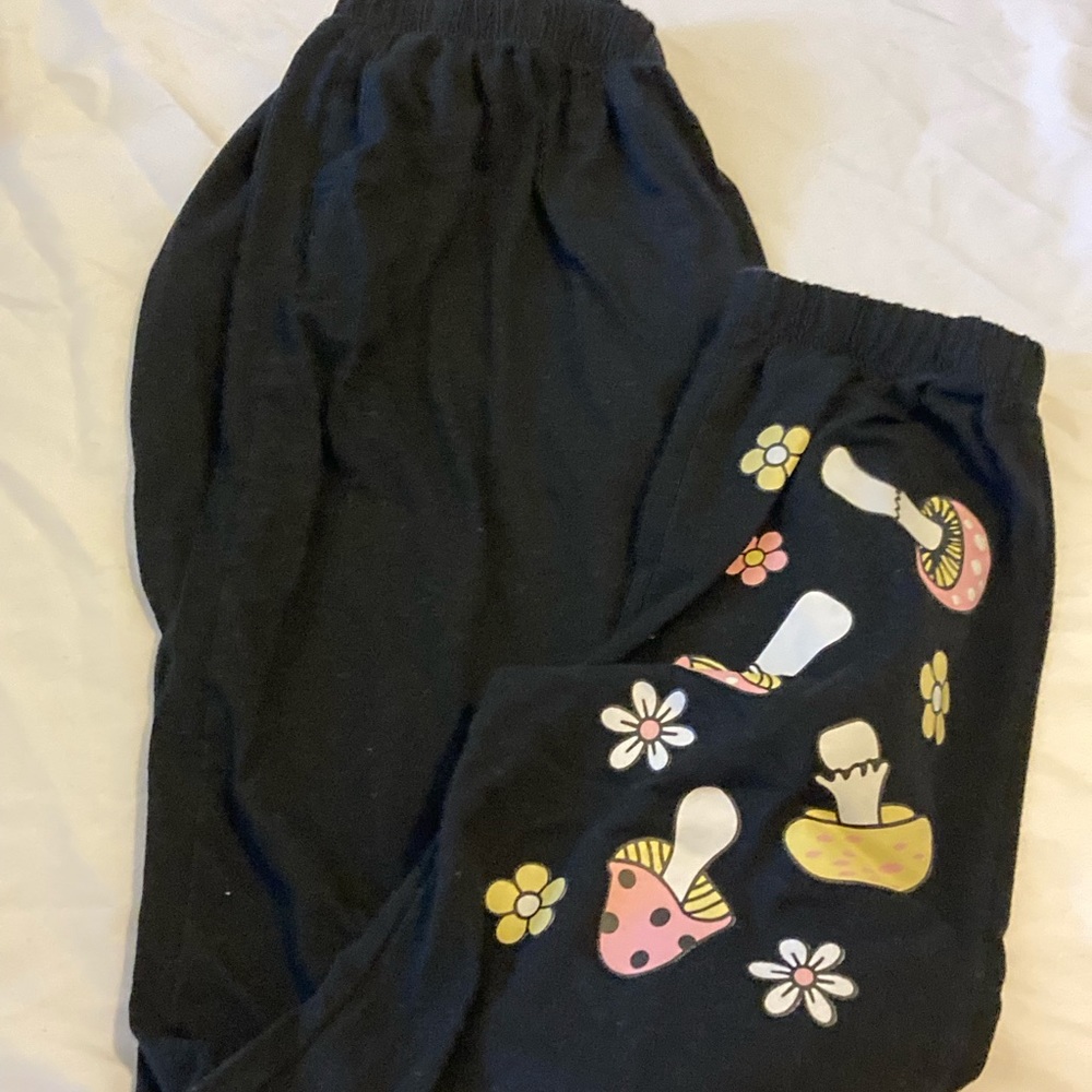 black sweatpants with design